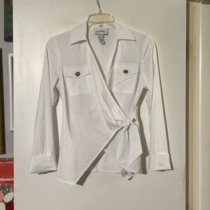 Joseph Ribkoff white wrap shirt. Breast flap pocket with brass buttons.